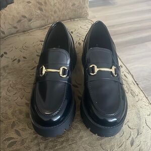 Black Loafers with Gold Detail
